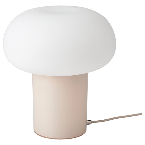 A DEJSA lamp with a light pink base and a rounded white glass shade, featuring a nickel-plated detail.