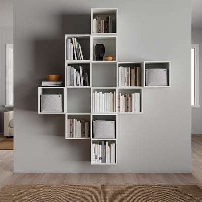 Unique wall-mounted bookshelf - EKET, white, modern design, storage, books, decor.