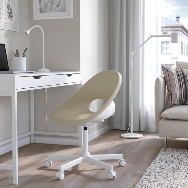 Home office: ELDBERGET chair, desk with lamp, sofa, window