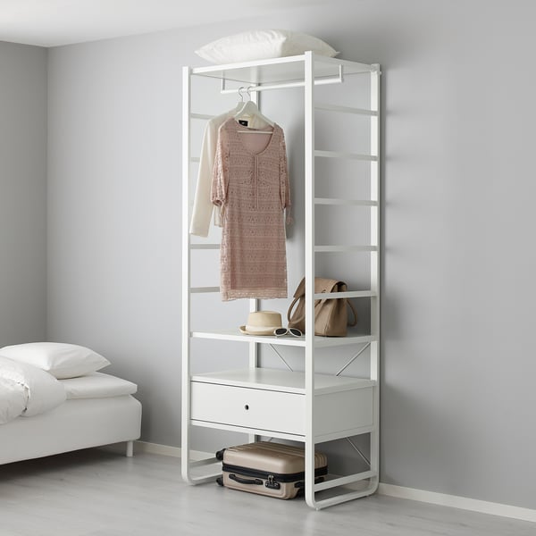 White ELVARLI wardrobe with shelves and drawers. Hangs dress and accessories, fits under bed.