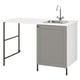 ENHET white laundry unit with gray cabinet, stainless sink, black legs, modern design.
