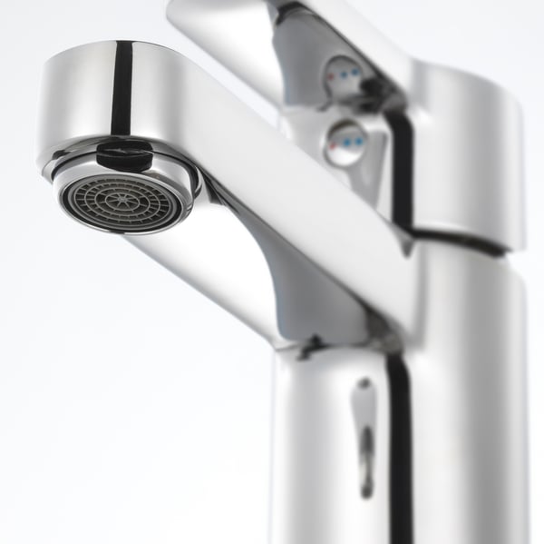 Modern chrome tap with sleek, curved design and built-in aerator; part of high-quality ENSEN brand.