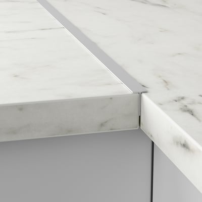 Marble counter with water barrier.