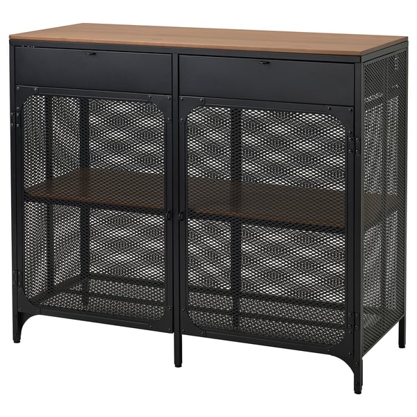 Displays a black FJÄLLBO sideboard with a wooden top. It a metal mesh design and two glass doors, providing a modern industrial look.