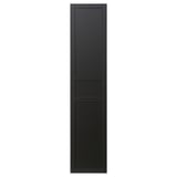 A black FLISBERGET door with three panels, featuring subtle grooves and a scandinavian design.