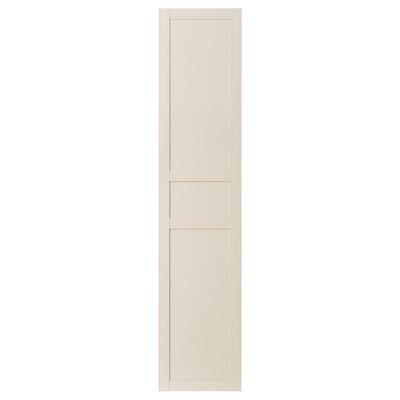 Beige fiberboard door, three panels, subtle grooves.