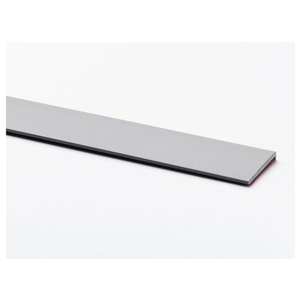 Silver kitchen cabinet trim, sleek, high-quality plastic.
