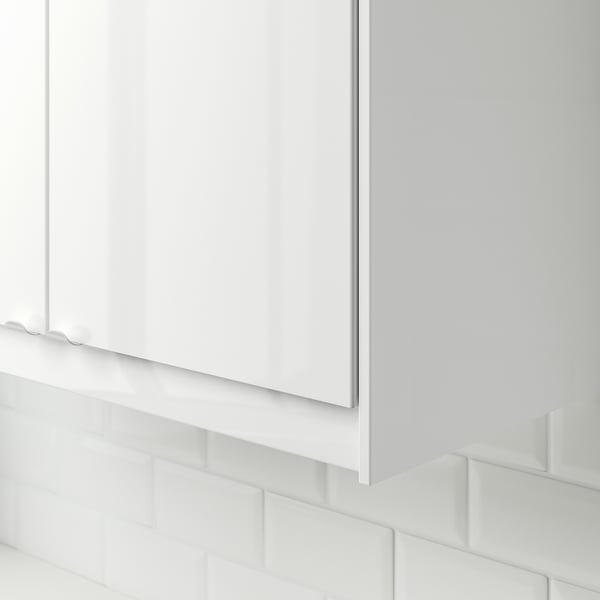 White cabinet edge protector hides cords, part of FÖRBÄTTRA series with easy cleaning and 25-year guarantee.