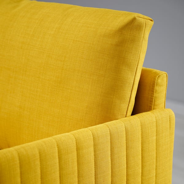Bright yellow FRIDHULT sofa bed, firm cushions, sleek design, perfect for small spaces.