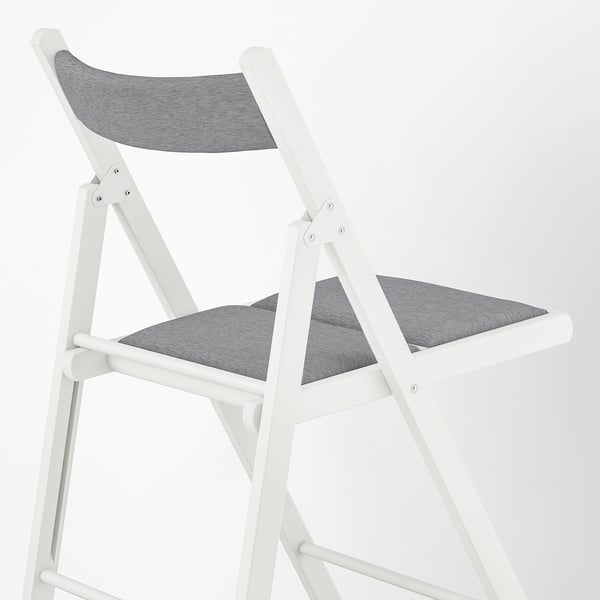 Foldable white chair with grey cushioned seat and back, designed for small spaces. Sturdy wooden frame, comfortable foam padding.