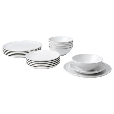 Stacks of white plates and bowls. Simple, modern design. Glazed stoneware material. Suitable for everyday use and parties.