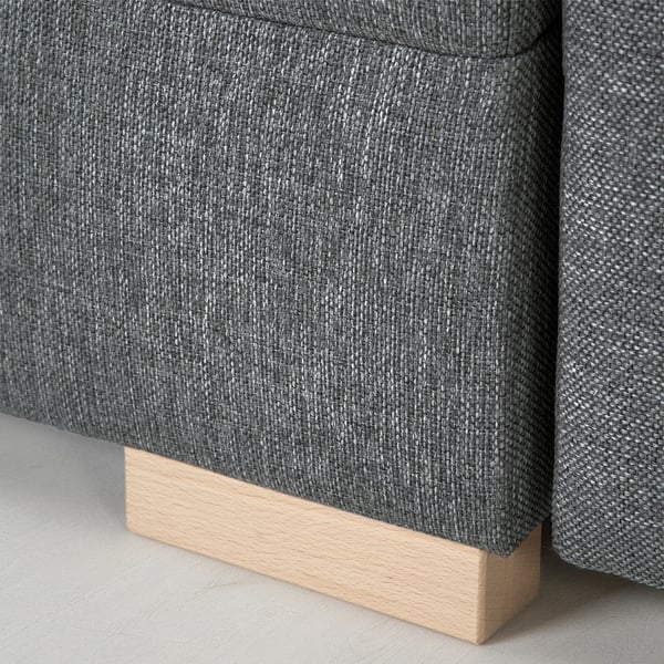 Close-up of gråviken sofas sturdy, grey, upholstered side with wooden base.