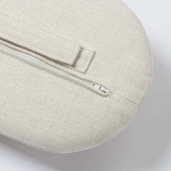 A circular cushion with a beige zip and quality white fabric, designed for comfort and easy cleaning.