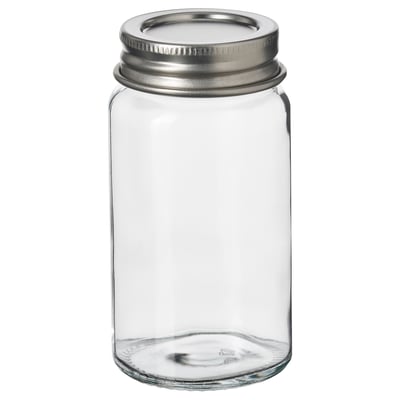 GULDFISK: small, clear glass spice jar with silver lid, round shape, simple design.