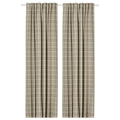 Two beige HÄGGVECKMAL curtains with tartan pattern, room-darkening, wool-like texture, hanging straight.