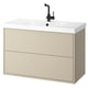 Beige wall-mounted bathroom cabinet with white sink and black tap, minimalist design.