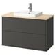 The HAVBÄCK vanity in dark grey with a light wood countertop and white sink.