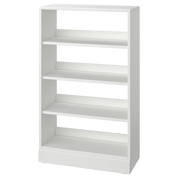 A white wooden HAVSTA bookshelf with four adjustable shelves; simple, rustic scandinavian design.