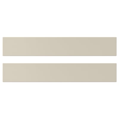 Image shows two smooth, beige HAVSTORP kitchen cabinet fronts. Rectangular shape with clean lines.