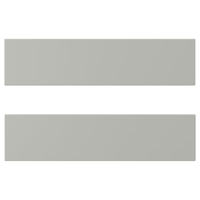 Two modern, light grey, rectangular cabinets with smooth surfaces and straight edges.
