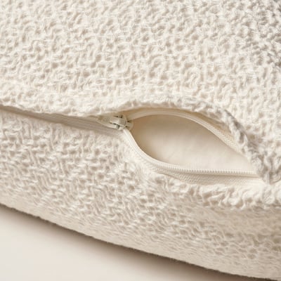 White woven cushion cover with zip, textured cotton.