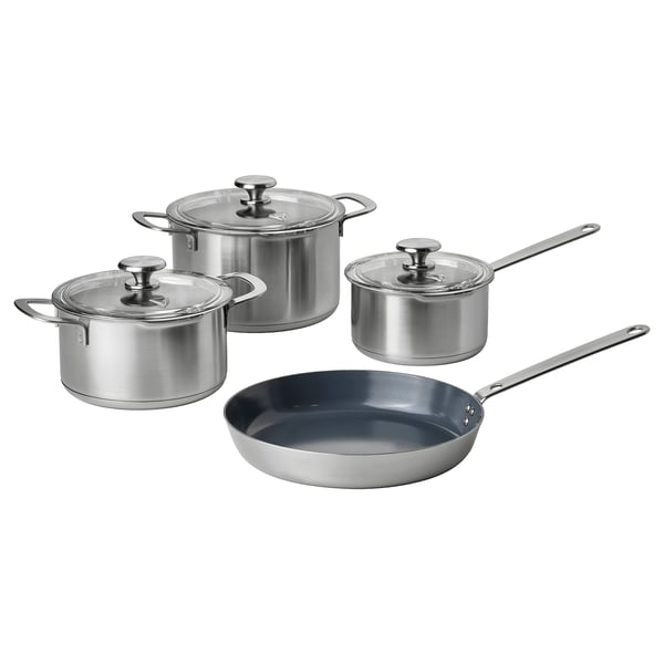 HEMKOMST cookware set: stainless steel pots, pans, blue ceramic frying pan, glass lids.