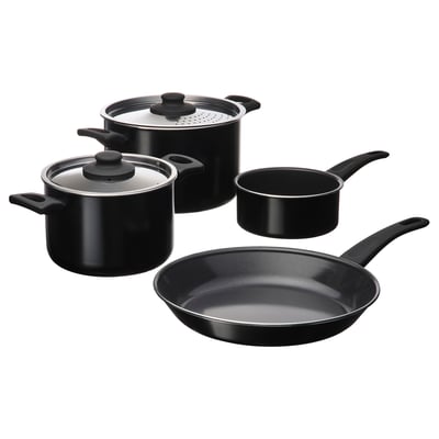 HEMLAGAD cookware in black. It includes pots and pans with non-stick surfaces and comfortable handles.