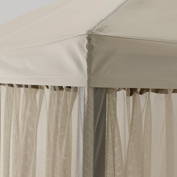 Close-up of durable, uv-resistant, beige gazebo canopy with mesh side panel.