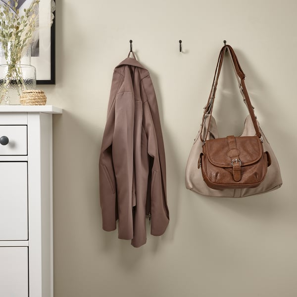 Three wall hooks: coat, bag, one free. Keeps items organised.