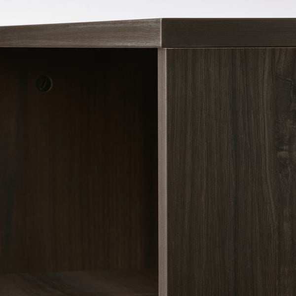Dark wooden furniture with sleek edges, smooth finish, and visible grain texture.