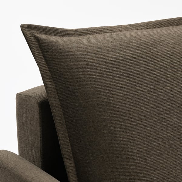 Close-up of olive sofas cushions, showcasing plush, textured fabric and clean lines.