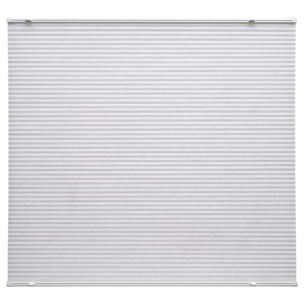 A white HORNVALLMO pleated window blind with a cordless design. It a textured, horizontal pattern and is made of recycled polyester.