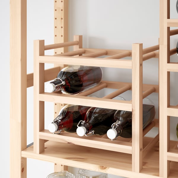 Wooden wine rack holding six bottles, part of expandable HUTTEN series.