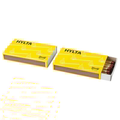 Two yellow boxes labelled HYLTA, one open showing matches inside, made of recycled paperboard.