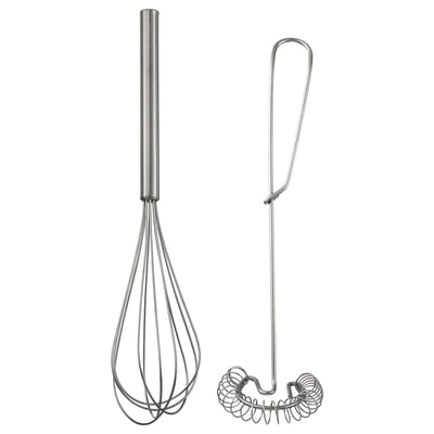 Two stainless steel kitchen tools: a whisk and a spiral masher. Imaged against white.