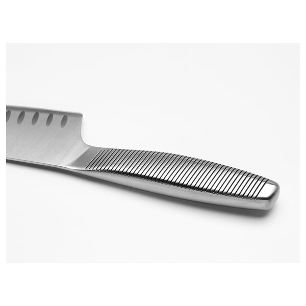Stainless steel knife with grooved handle and blade indentations for easy food slicing and non-slip grip.