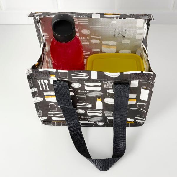 Bag with red water bottle and yellow container, black patterned handles.