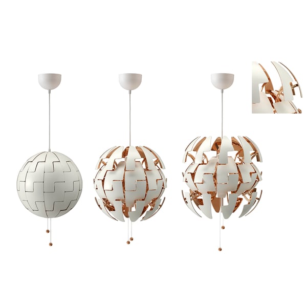 Three spherical hanging lamps with pull strings, showing varied shapes and light intensities.