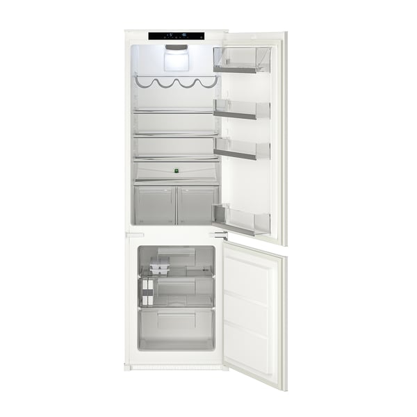 Displays an ISANDE white fridge-freezer with clear compartments and digital controls. Its a built-in model with no-frost and adjustable glass shelves.