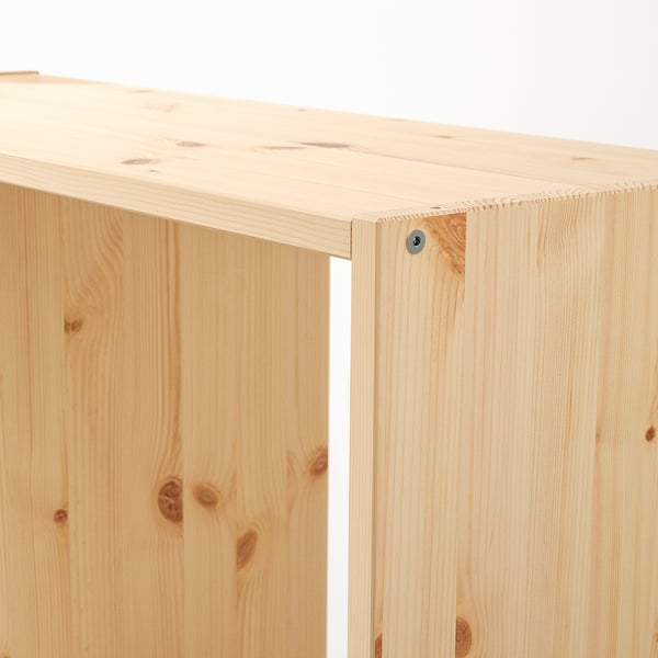 Close-up of IVAR pine shelf, showing fine grain and quality craftsmanship.