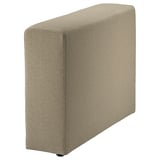 A JÄTTEBO cushion cover in beige. Its rectangular with rounded edges, made from soft, plush fabric combining polyester, viscose, and cotton.