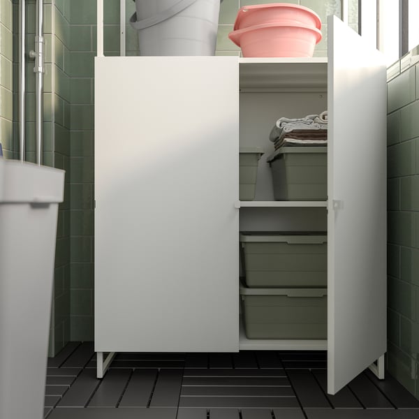 White JOSTEIN storage cabinet, metal, rectangular, for bathroom or laundry room.