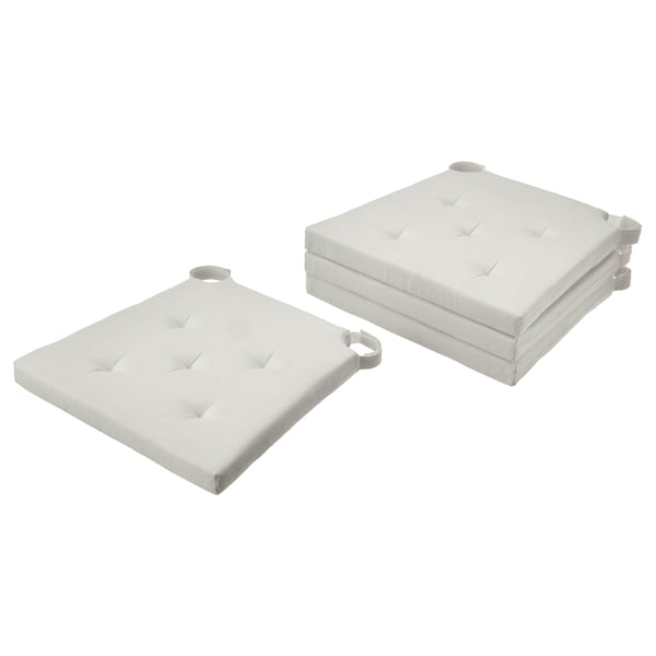 Two light grey rectangular chair cushions, one folded, one lying flat, with tufted designs and loop fasteners.