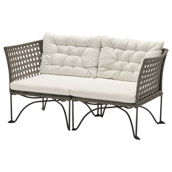 JUTHOLMEN outdoor sofa, white cushion, woven gray plastic rattan with metal legs.
