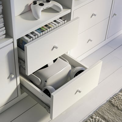 White KALLAX drawer unit, square shape with smooth finish, two drawers, flat surface.