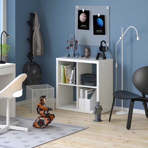 KALLAX bookshelf in kids room with toys and decor.