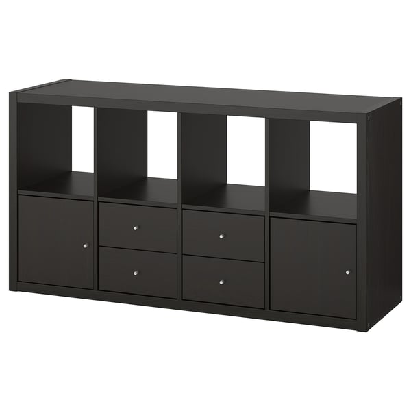 A KALLAX black shelving unit with drawers, combining open and closed storage spaces.