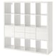 White KALLAX shelf unit: modern, modular design with multiple compartments and drawers for storage. Ideal for organizing various items.