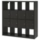 A black ikea KALLAX shelving unit with a mix of open and closed storage compartments. It a rectangular shape and modern design.