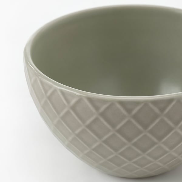Green bowl with diamond pattern.